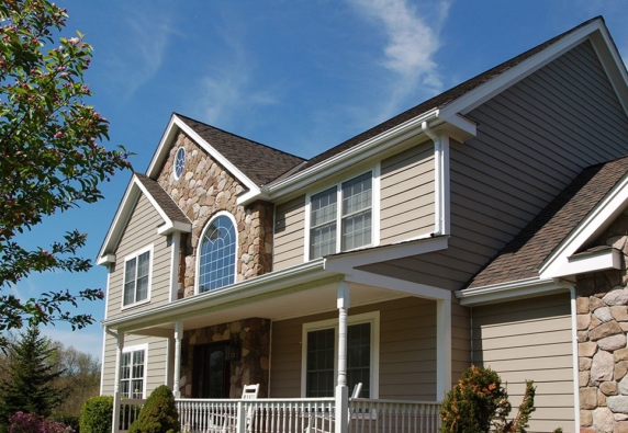 Everlast siding with stone exterior