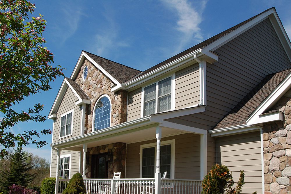 Everlast siding with stone exterior